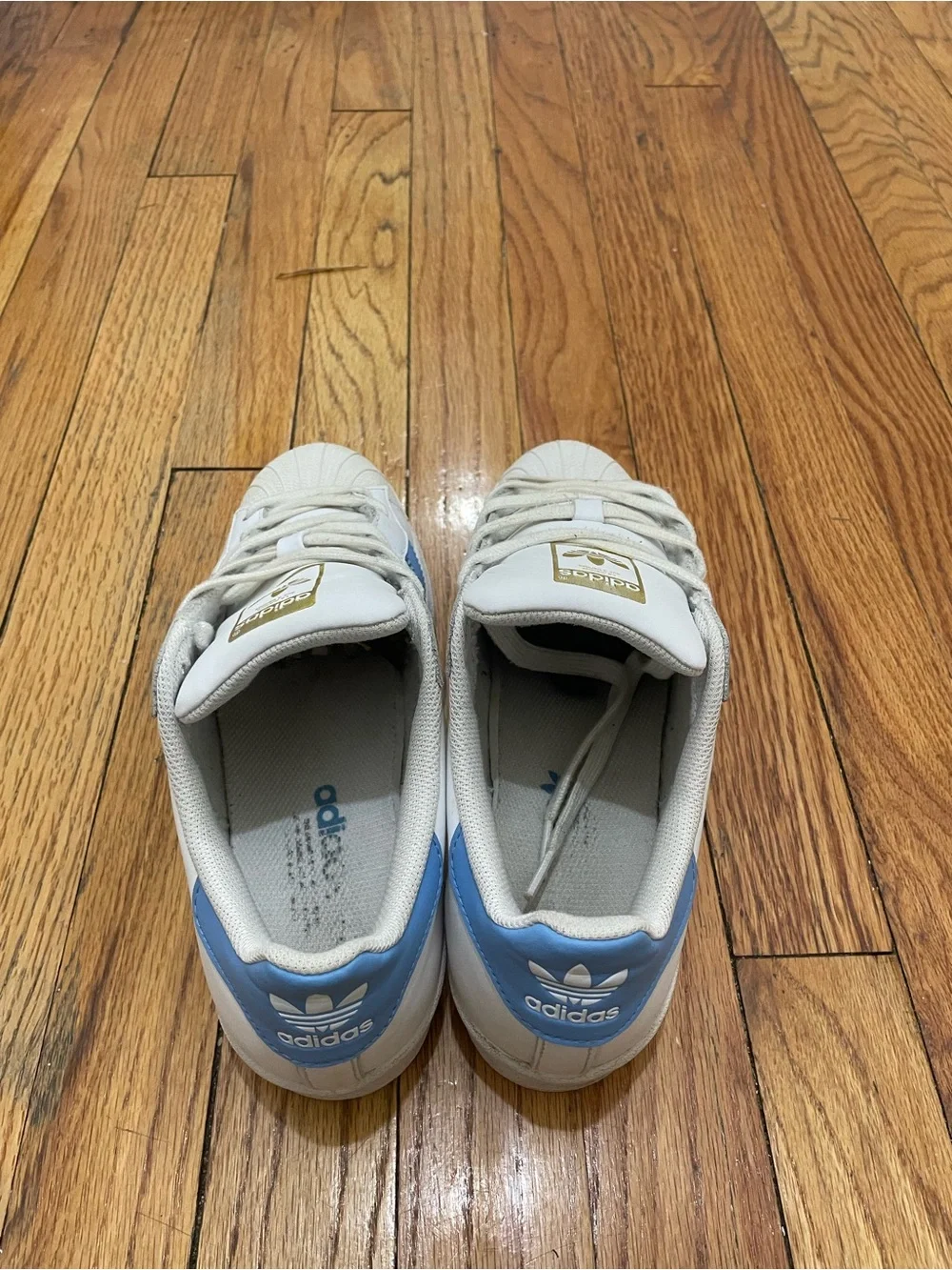adidas Superstar Men’s Sneakers in White with Light Blue Stripes